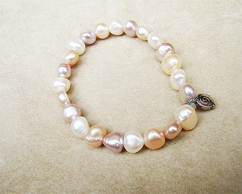 Pulsera de Perlas blancas, malvas y rosas