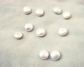 Perla center 12-13x6-7mm. blanca