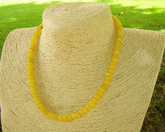 Topacio amarillo en rondel facetado 8x6mm. Tira (hilo) 40cm.